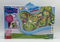 Front of sealed box showing Peppa Pig Town Tour Maze playset artwork and contents.