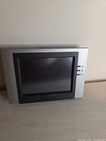 Front view of Honeywell touchscreen monitor showing display and side buttons