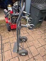 Full view of Milwaukee steel hand truck showing frame, wheels and stair climber