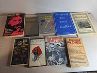 All nine books displayed front covers