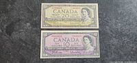 Both 1954 Canadian $20 and $10 banknotes side by side