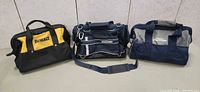 Three soft tool bags side by side