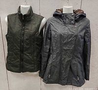 Front view of both jacket and vest on mannequins