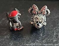 Front view of both charms