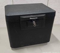Closed SentrySafe file safe box front view