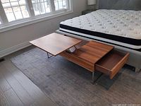 Table showing lift-top extended and drawer closed