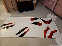 Full view of large vinyl decal sheet on floor