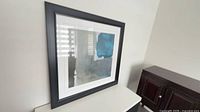 Front view of framed abstract print