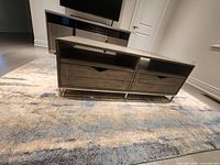 Front view showing drawers and open compartments