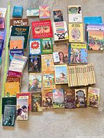 Overview of entire book lot laid out on floor