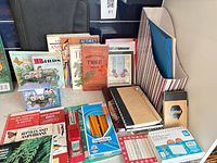 Overall lot showing books, stationery and file holder