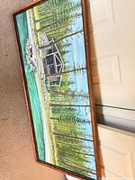 Full view of Eugene Ellingson landscape painting in frame