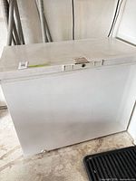 Front and top view of white chest freezer