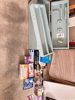 Toolbox opened with inner tray and bulb boxes arranged below