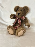 Front view of brown Boyds teddy bear sitting upright