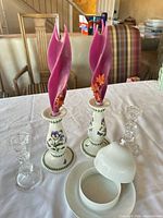 Overall view showing ceramic holders with candles, glass holders, sugar bowl set