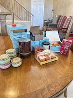 Overview of boxed candles, jar candles and pillar