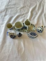 Group shot of all porcelain pieces on table