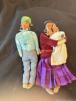 Front view of both cloth dolls together