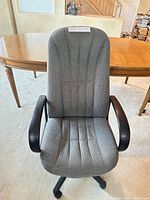 Front view of grey upholstered office chair