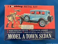 Top of box showing artwork, brand and model designation