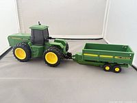 Tractor hitched to wagon showing full set