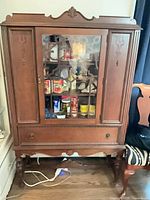 Front view of china cabinet showing overall design and glazing