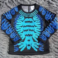 Front view of Adidas x Mary Katrantzou long-sleeve top showing overall design and pattern