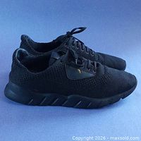 Left and right Fendi Roma black mesh sneakers side view