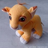 Front angled view of 1993 Simba plush standing upright
