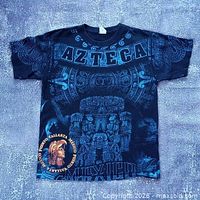 Full front view of graphic T-shirt laid flat