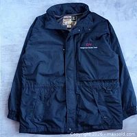 Front view of black WearGuard jacket with CN Dangerous Goods Team logo