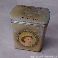 Front view showing Queen Elizabeth II portrait and worn cream paint