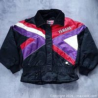 Front view of Yamaha colour-block racing jacket showing embroidery, pockets, waistband and overall condition