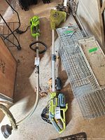 Full view of Radley cordless rototiller with battery attached on floor