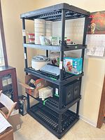 Full view of black resin five-shelf unit