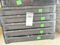 Front view of stacked shelves with lot tag visible