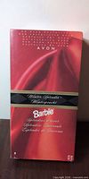 Front of red Winter Splendor Barbie box showing Avon branding