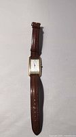 Full view of watch showing case, dial and strap