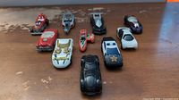 All ten cars arranged on tabletop