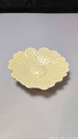 Top view of yellow daisy ceramic dish