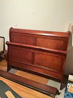 Headboard and footboard showing mahogany finish