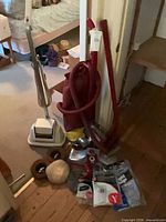 Overall lot including vacuum body, hose, wands, attachments, polishing pads and vacuum bag package