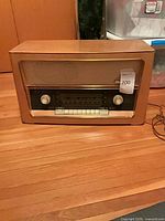 Front view of Metz wood console radio