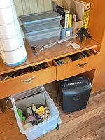 Overall view showing shredder, storage bins and supplies