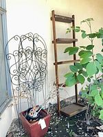 Group shot of ladder shelf, trellis panels, planter