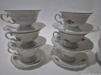 Stacked view of all six teacup-saucer pairs