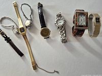 All seven wristwatches laid out for overview