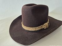 Front angle of brown felt hat with braided band