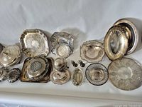 Group shot of all silver-plate items laid out